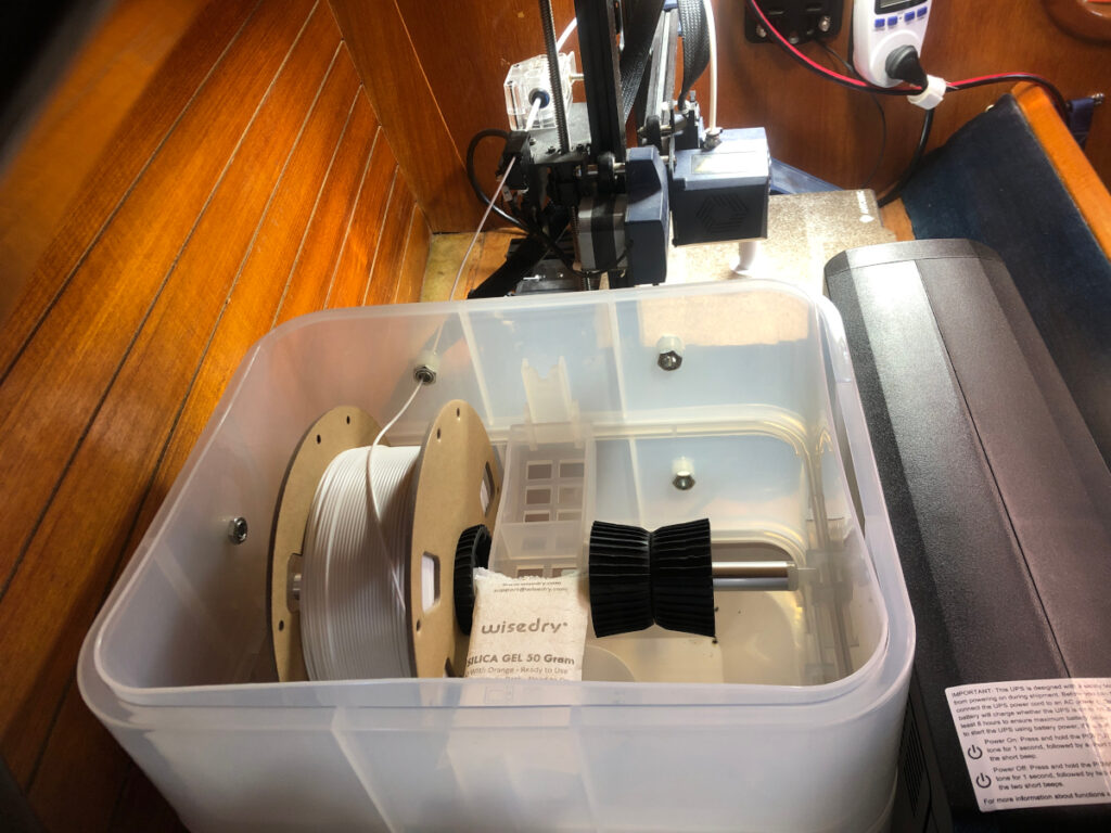 Filament dryer has room for two spools and gets hot enough to recharge dessicant packs.